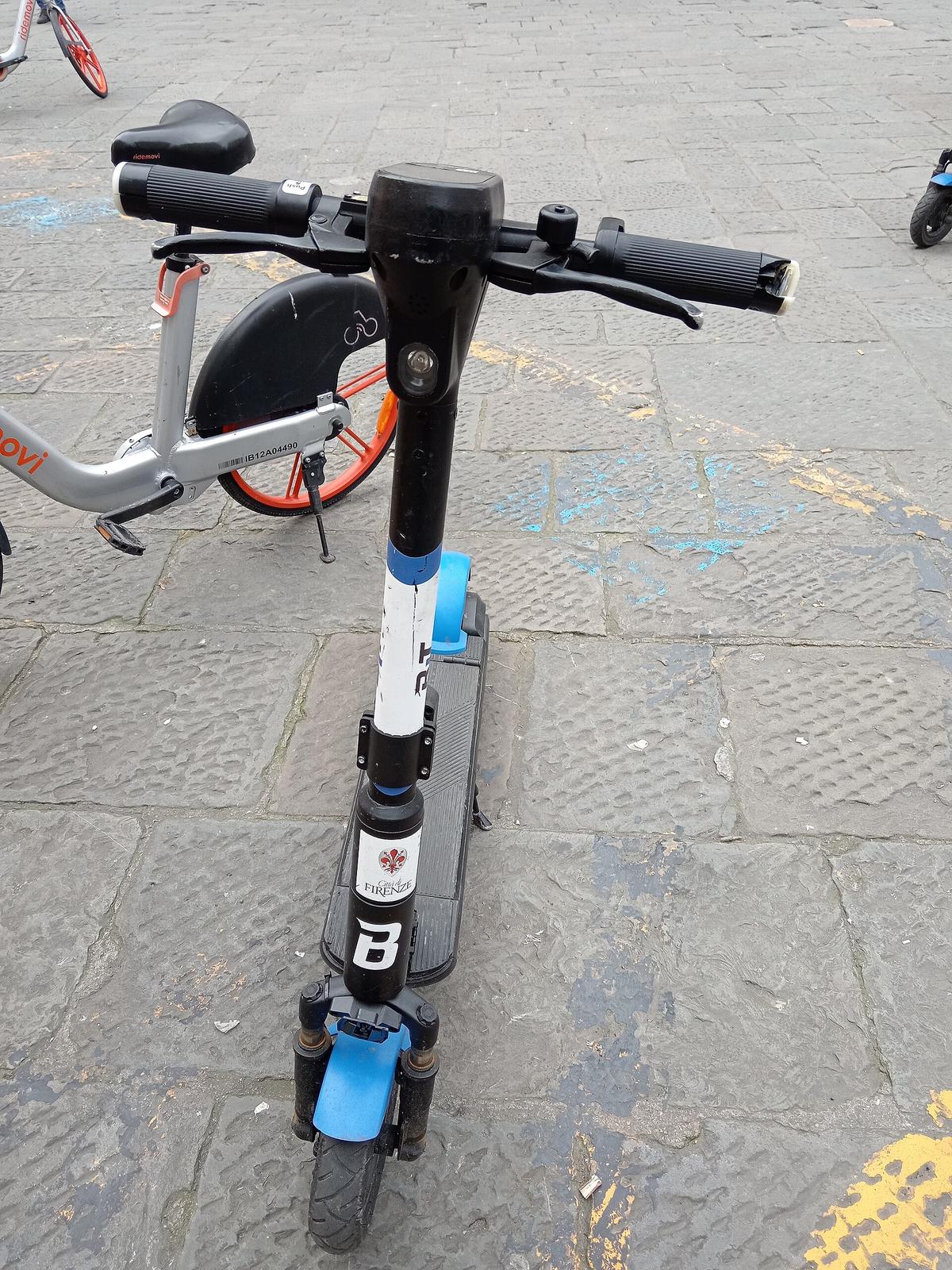 Climbing and Descending Hills on an Electric Scooter with Declining Battery Power